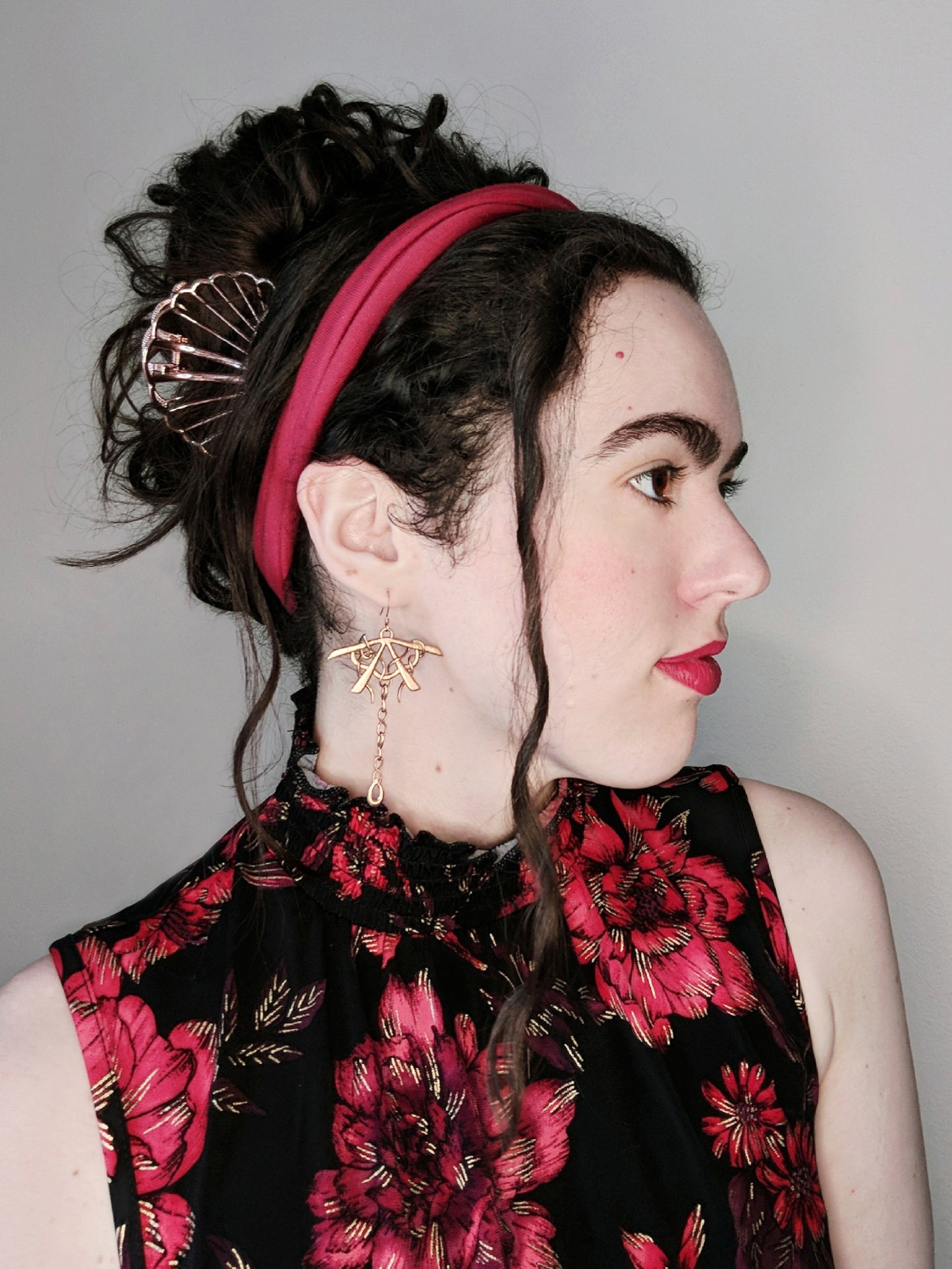 Female model in profile wearing Infinite Sunlight earrings