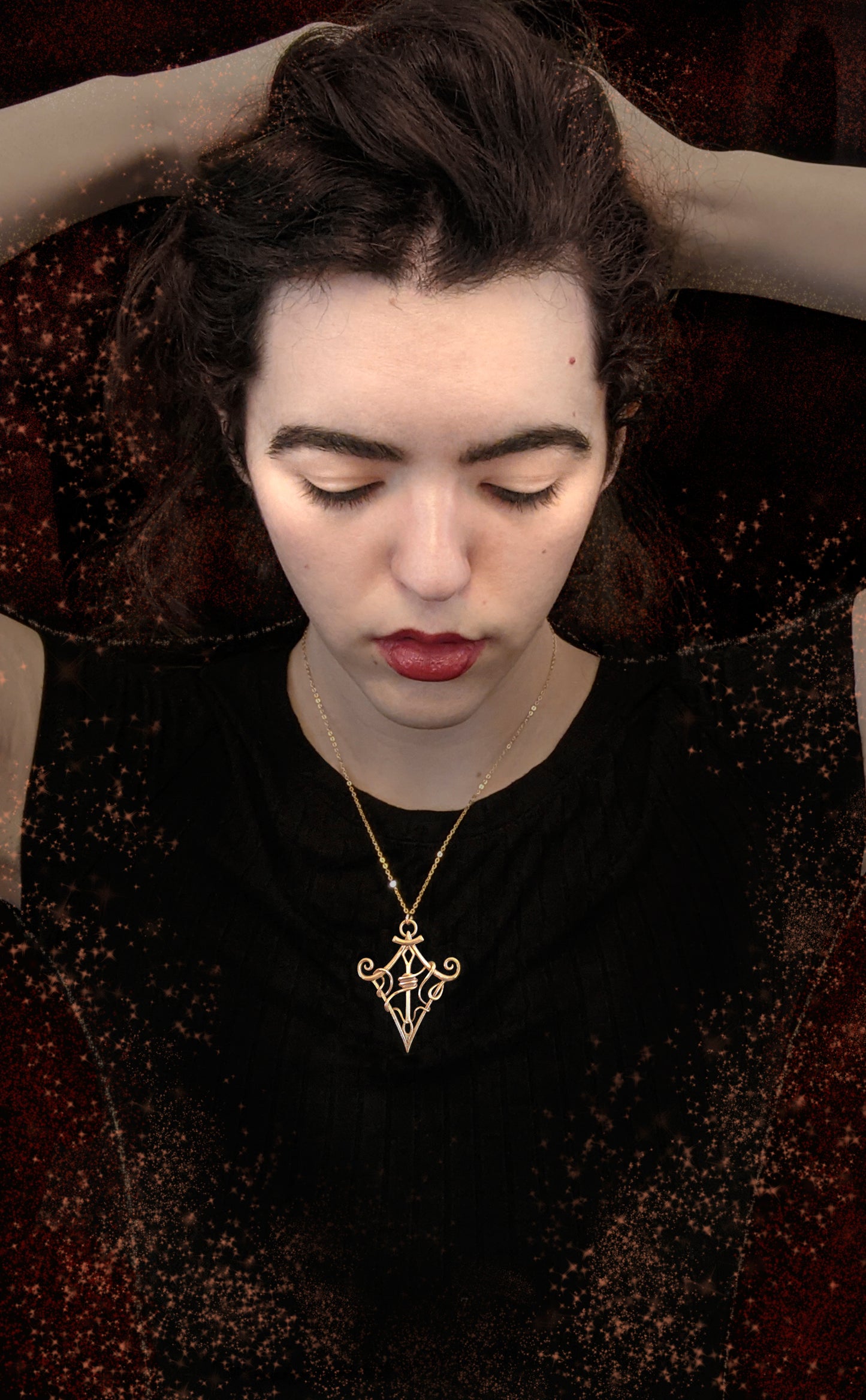 Female model wearing "Through the Eye" pendant.